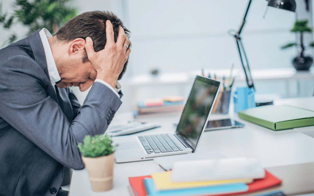 a man in distress with a computer issue